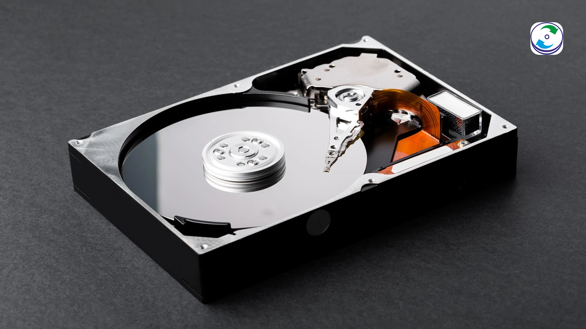 A close-up graphic of a hard drive's internal components with the actuator arm visibly hitting a stop, creating a stylized "clicking" soundwave effect over the platters, symbolizing a critical mechanical failure.