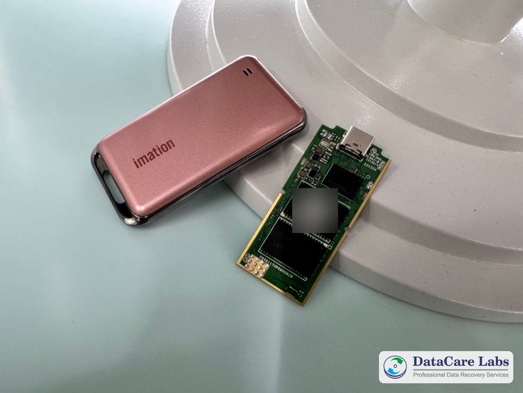Imation 1TB portable SSD board: controller and NAND chips SSD controller overheating: the Imation 1TB board out of its case, with the USB Type-C port, controller and two NAND memory chips